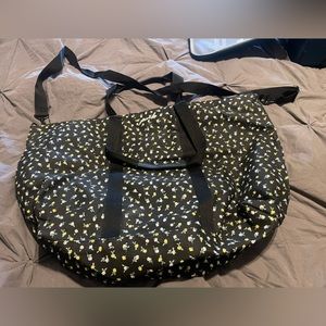 Pink duffel bag with flowers